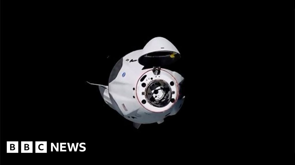 SpaceX Nasa Mission: Astronaut capsule docks with space station