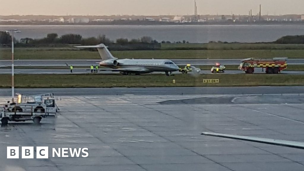Liverpool airport delays after plane overshoots runway