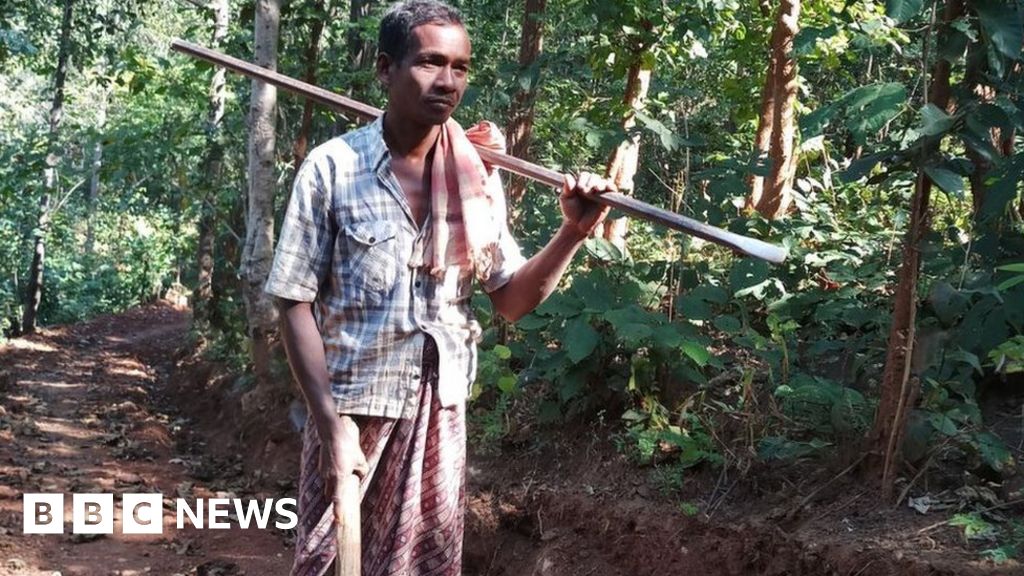 India man builds road to village so children can visit