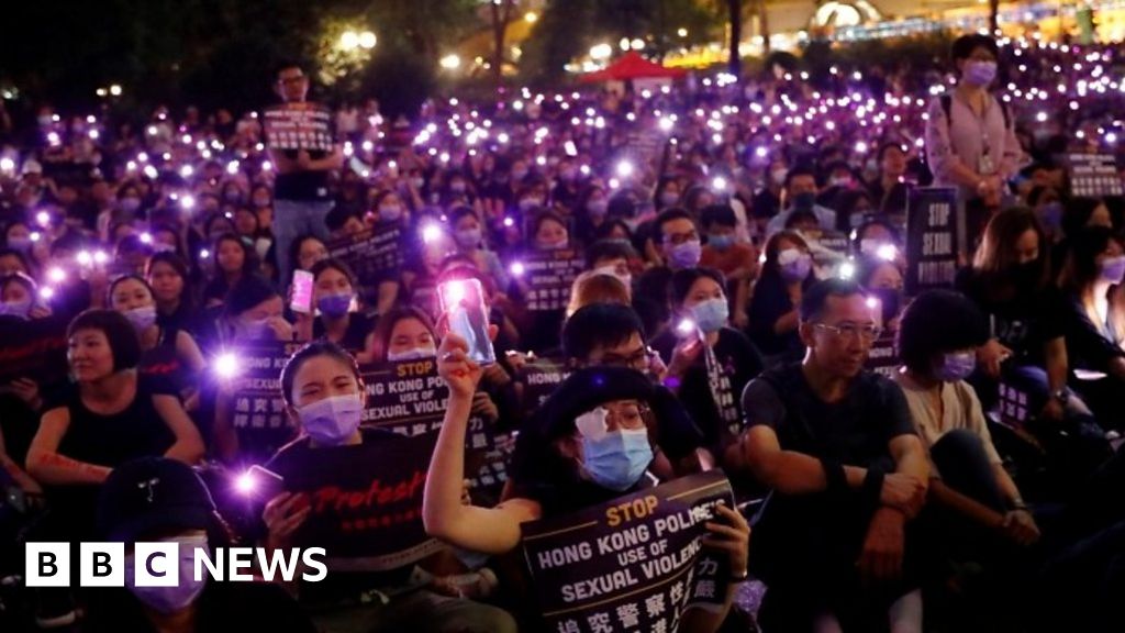 Hong Kong park lights up in sex abuse protest