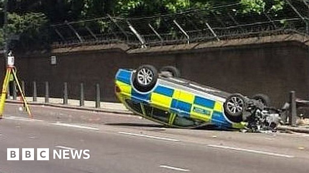 Met Police Car Overturns In London Moped Chase - BBC News