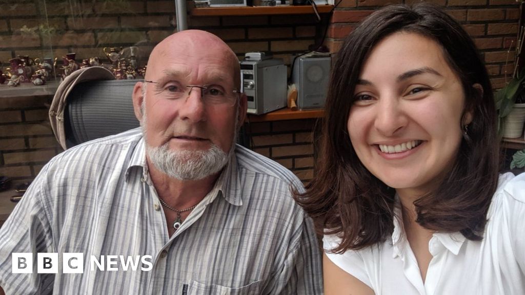 'Bike gift stranger' and former child refugee reunited