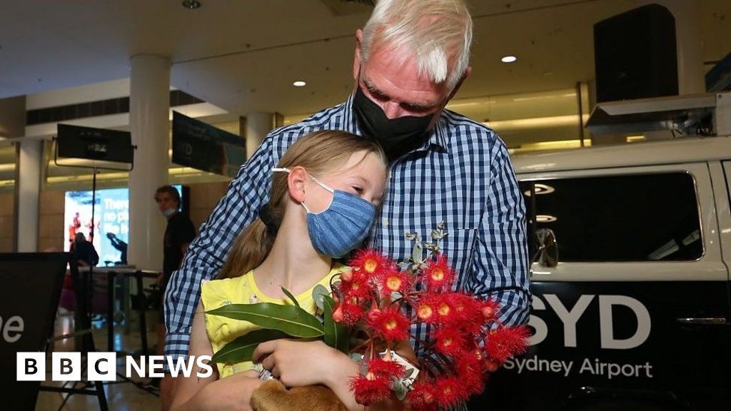 Joyful reunions as Australia opens to world after two years