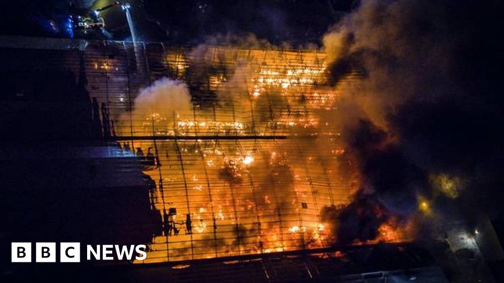 North Belfast: More than 60 firefighters tackle blaze - BBC News