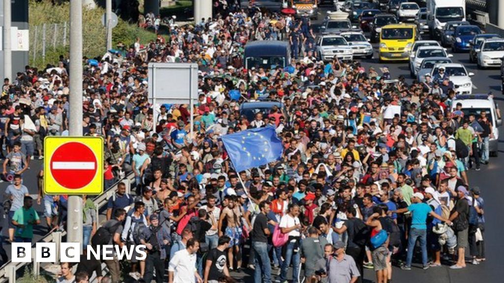 Migrant crisis Hundreds march in Hungary to Austria border BBC News