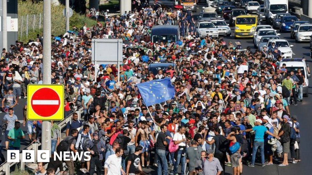 Migrant Crisis Hundreds March In Hungary To Austria Border Bbc News