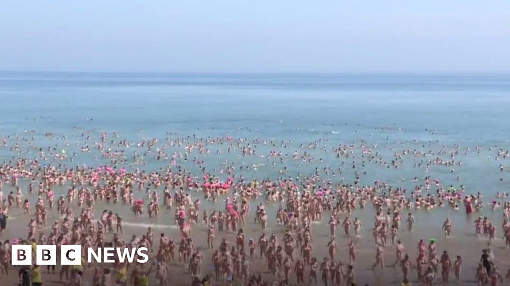 Skinny dip: World record broken on County Wicklow beach - BBC News