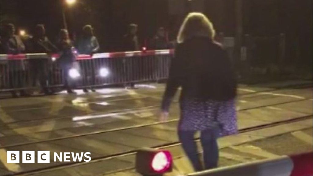 Pedestrians In Barnes Run Across Train Crossing BBC News