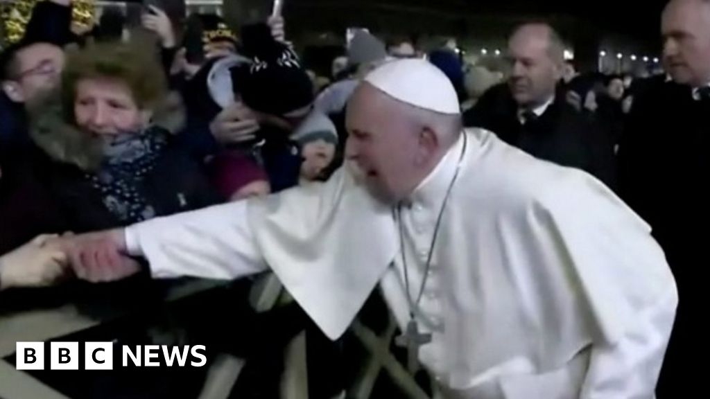 Pope Francis Slaps Pilgrims Hand After She Yanks His Arm Bbc News