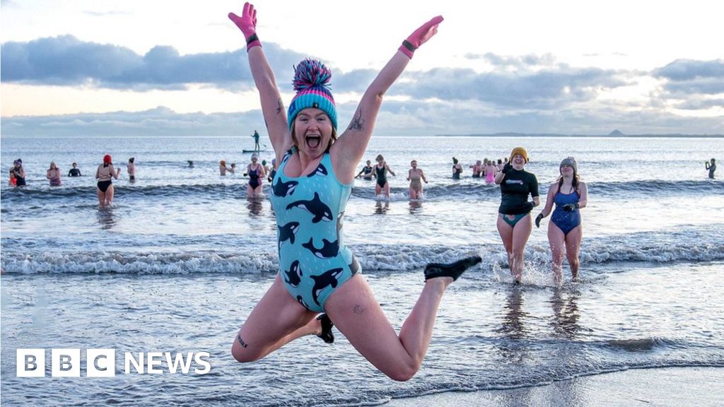 International Women’s Day: Hundreds take part in sunrise swim