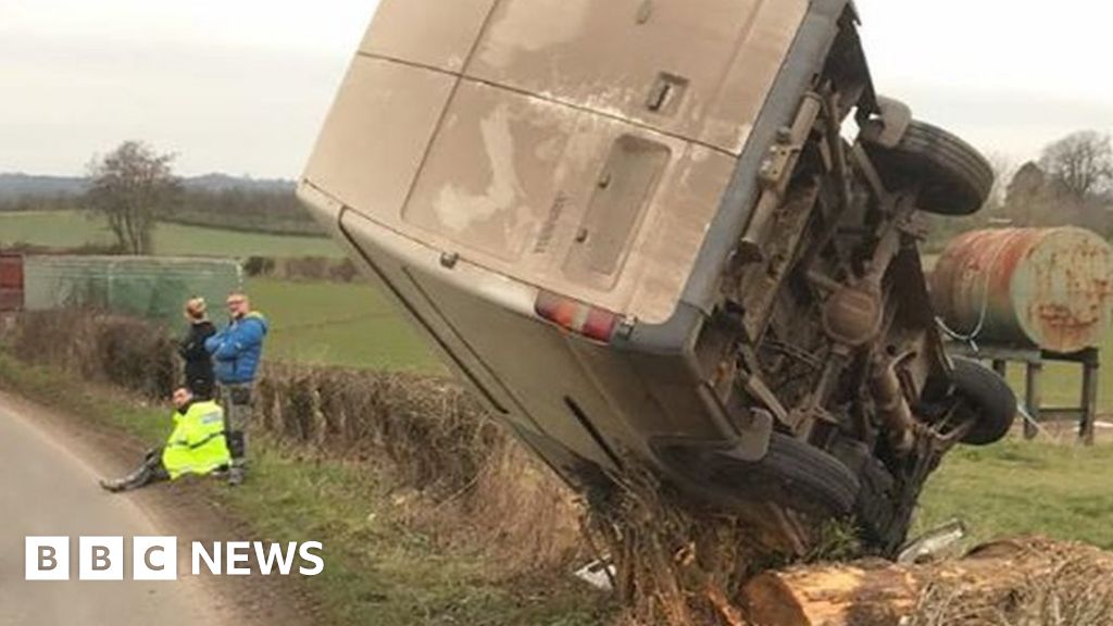 Herefordshire crash leaves van teetering on hedge Herefordshire crash leaves van teetering on hedge