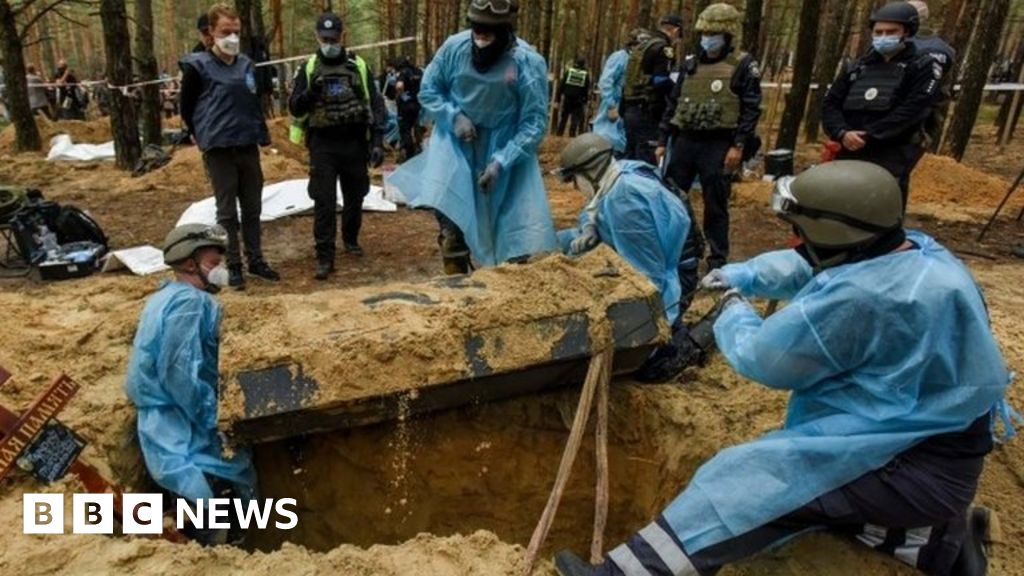 Ukraine war: Mass exhumations at Izyum forest graves site