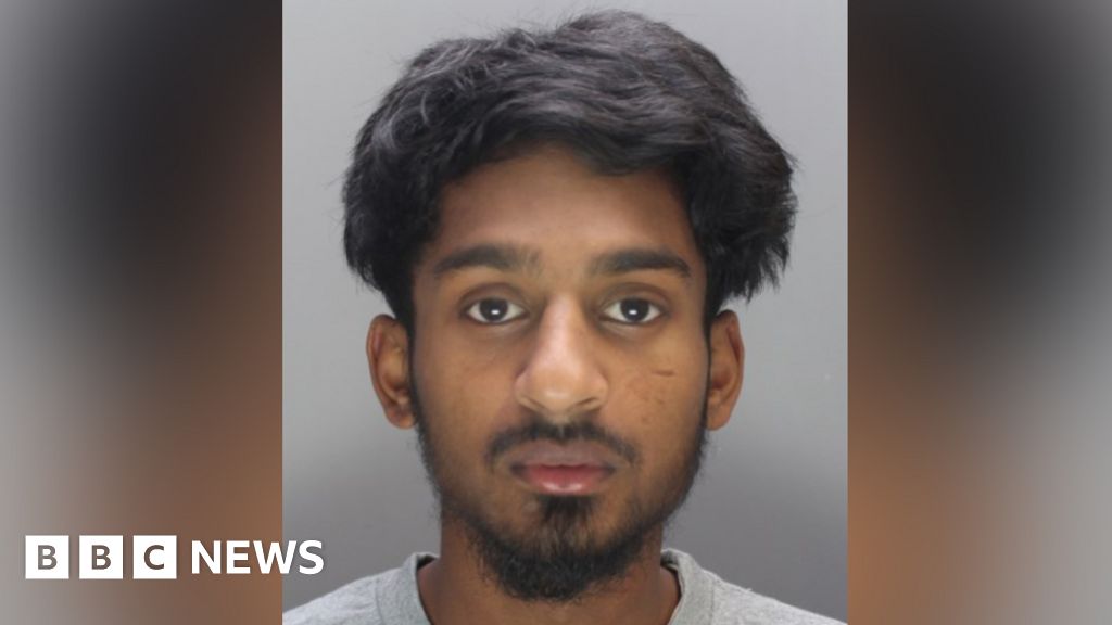 Driver caught on CCTV running over men jailed