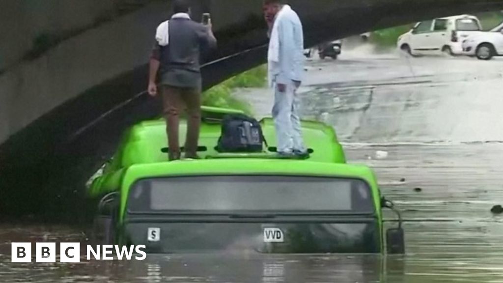 Dramatic Footage Shows House Collapsing Into Flood Waters Bbc News 