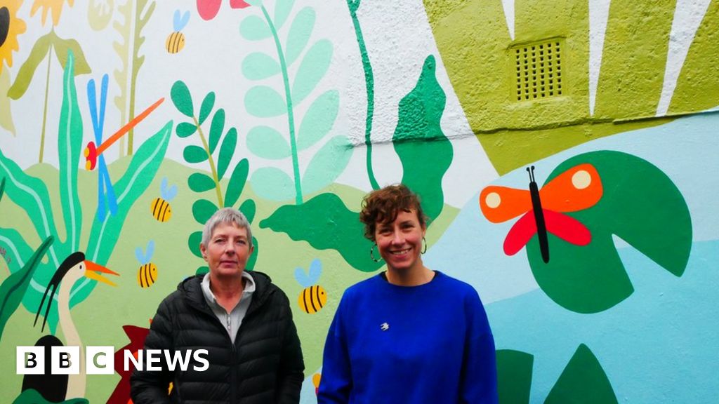 Colourful mural transforms dingy alleyway in Oxford