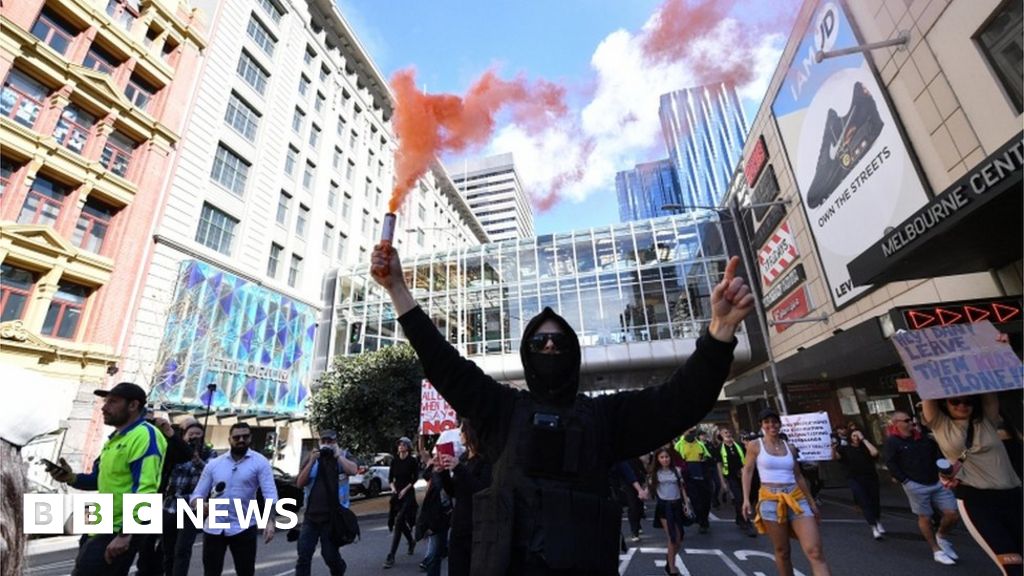 Police in the Australian cities of Melbourne and Sydney have clashed with thousands of people protesting against Covid lockdowns. It came as the state