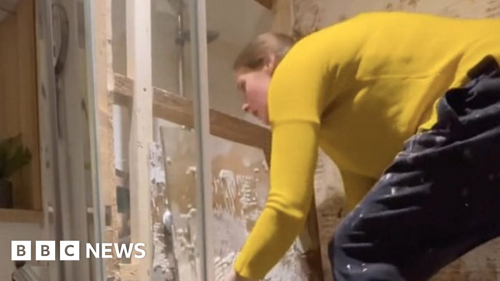 British woman finds a second shower behind her bathroom wall 