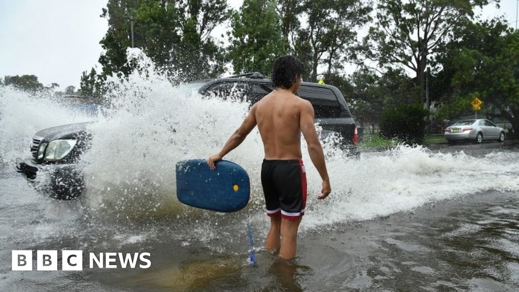 Sydney rains: Record rainfall brings flooding and douses fires