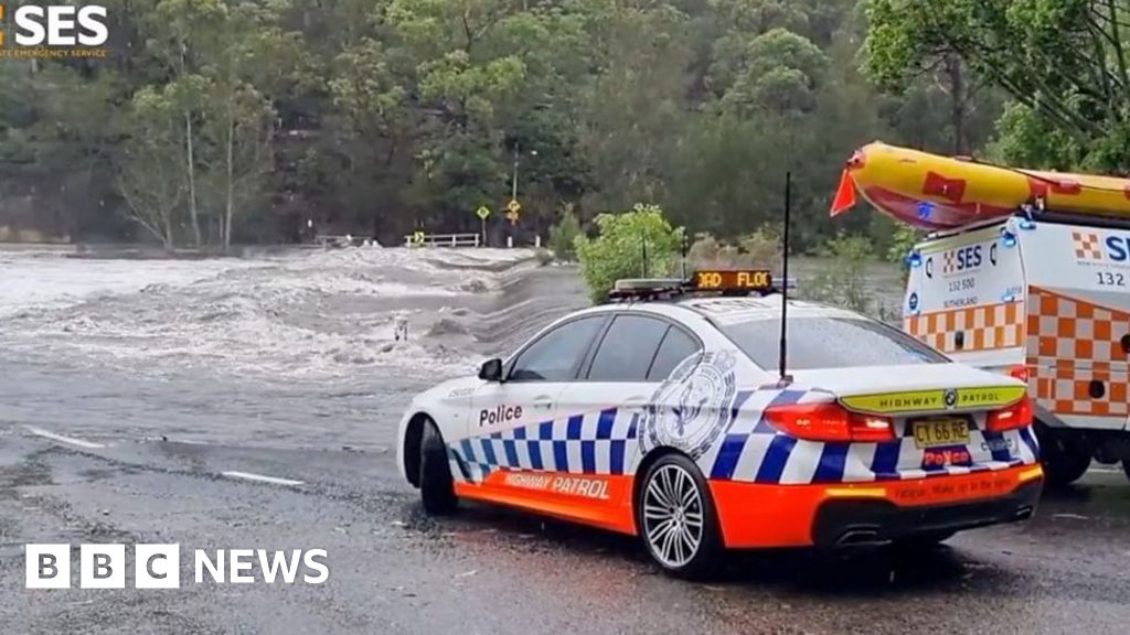 Australia floods: Woman killed as flash floods hit east coast