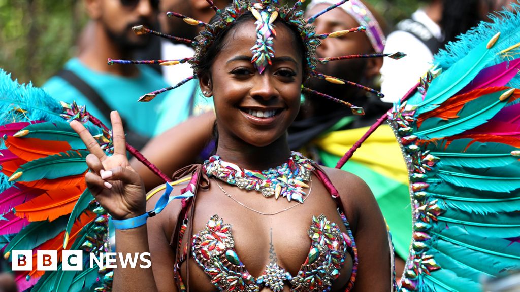 Notting Hill Carnival celebrates Windrush legacy in blaze of colour - BBC  News