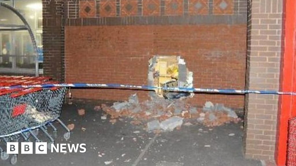 Whitehaven Aldi raiders pull cash machine through wall - BBC News