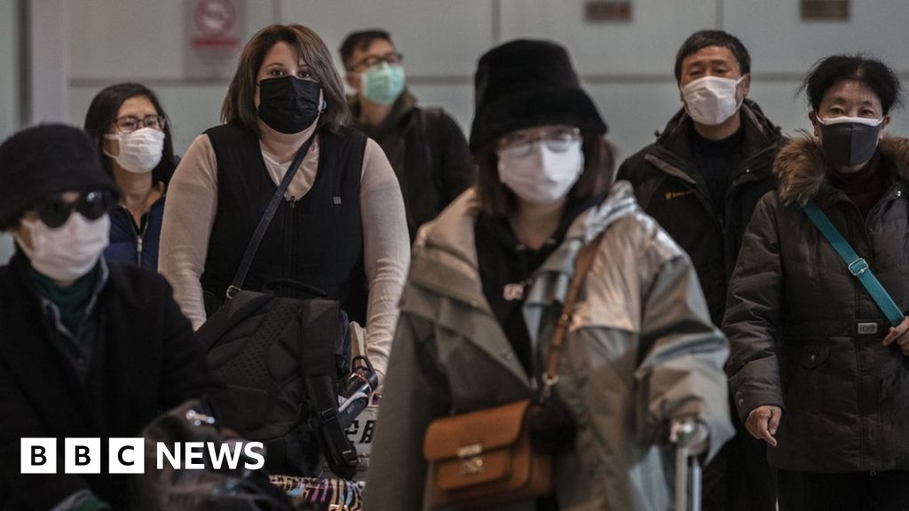 Coronavirus: Britons on evacuation flight home from Wuhan thumbnail