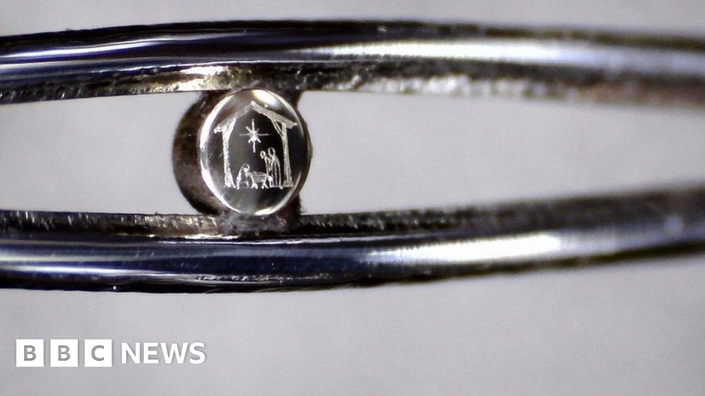 Tiny Nativity scene in the eye of a needle on display in Birmingham