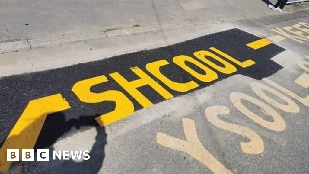 Swansea gas workers misspell school when repainting road 