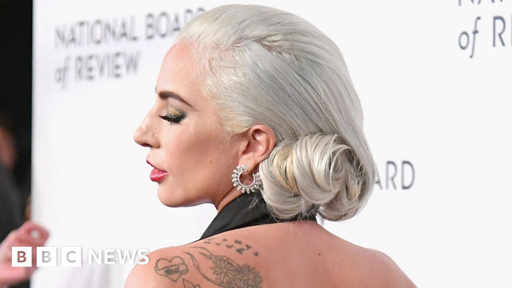 Lady Gaga 'appalled' by music tattoo mistake on her wrist - BBC News