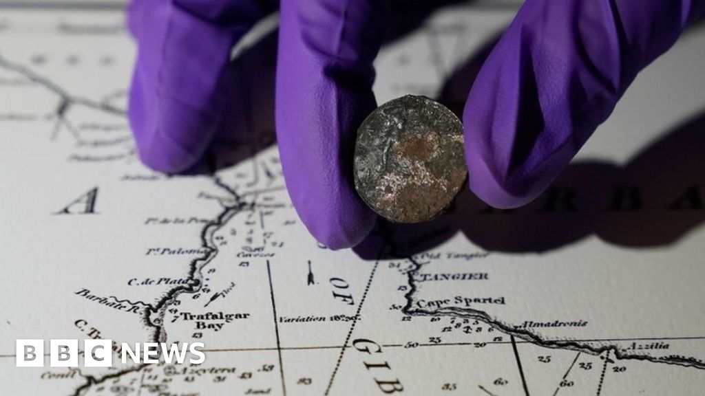HMS Victory: 'Good luck' farthing coin found under ship's mast