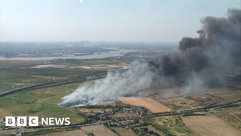 Fields and buildings ablaze on outskirts of London