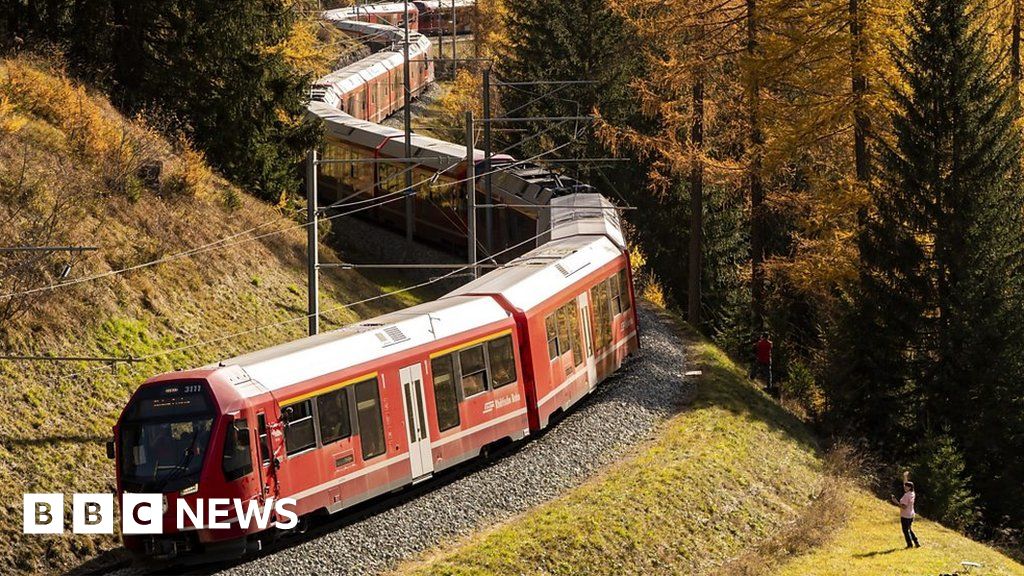 World’s longest passenger train rolls through Alps