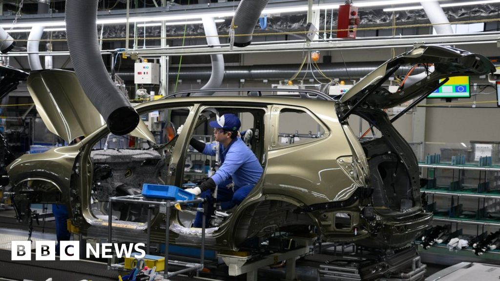 Japan avoids recession as growth figures revised