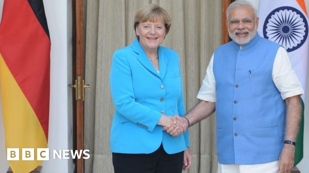 angela merkel signs key business deal with india s narendra modi bbc news