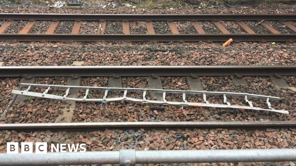 Youths tied ladder to Livingston railway tracks BBC News