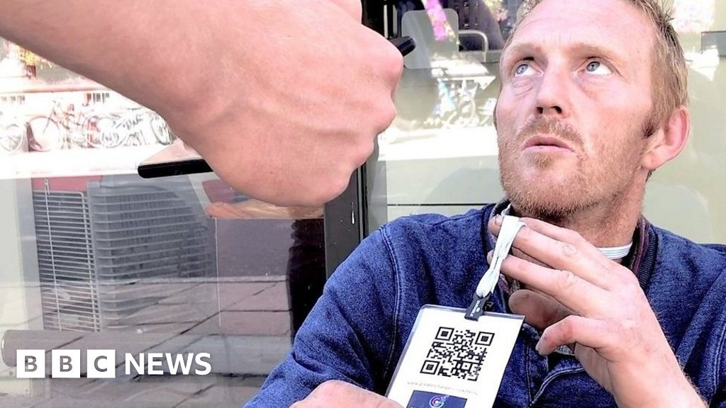 Would you scan a homeless person's barcode to give them money? - BBC News