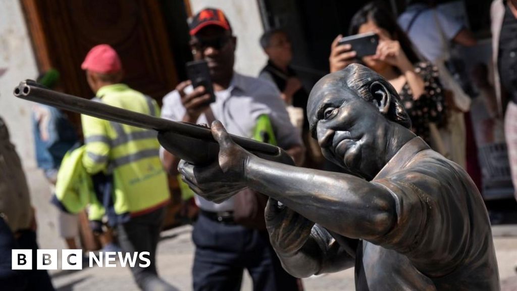 Statue mocking Spain's ex-king Juan Carlos appears in Madrid