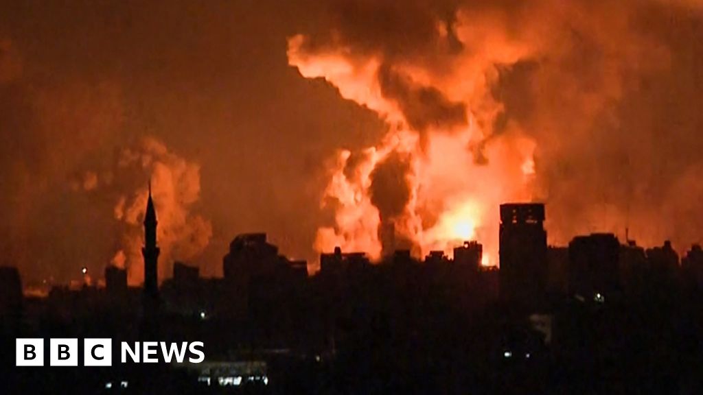 Explosions seen as Gaza Strip in darkness