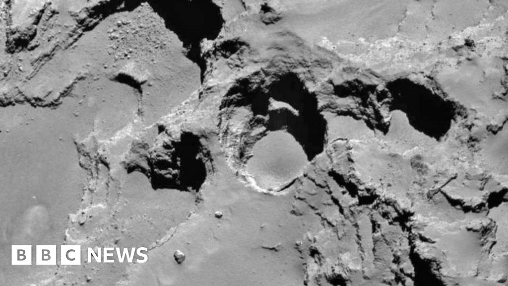 Rosetta spies cometary sinkholes - BBC News