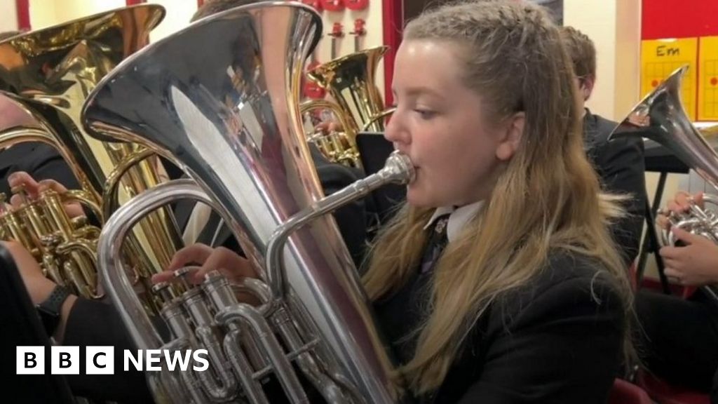 Tyldesley school brass band had Greatest Days in Take That film - BBC News