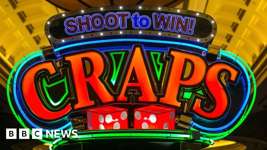 An illuminated sign for the casino game "craps" at Caesars Palace Hotel in Las Vegas, Nevada, 29 May 2017