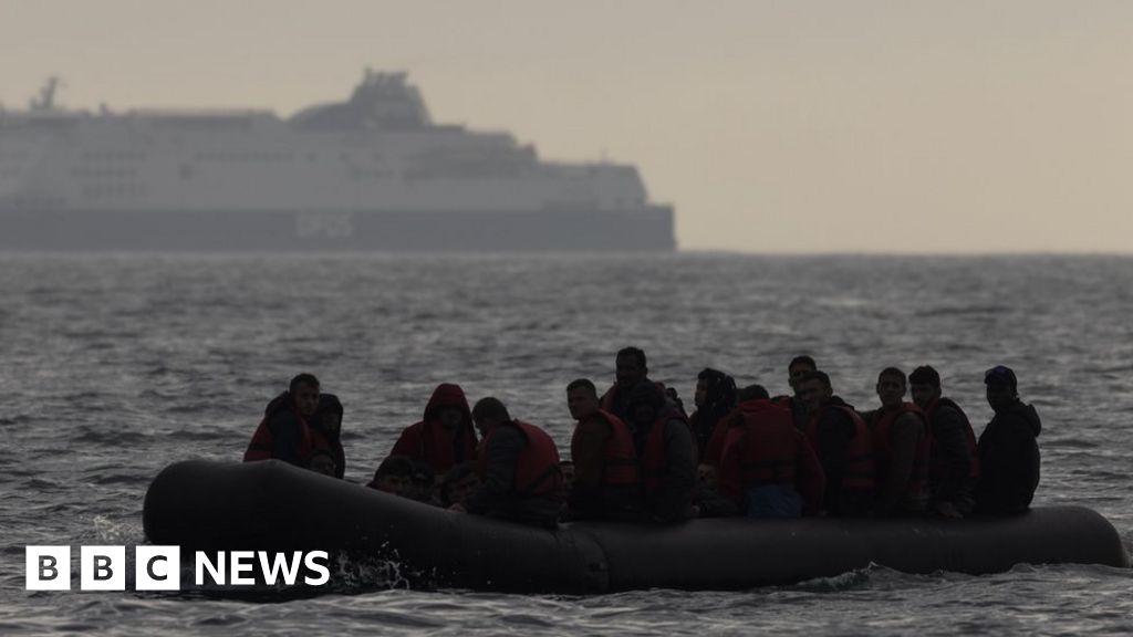 Where are asylum seekers being housed in hotels in the UK?