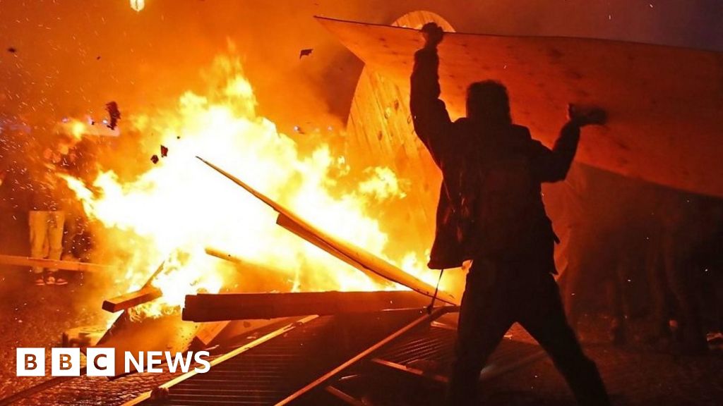 Violence erupts in Paris as pension protests proceed