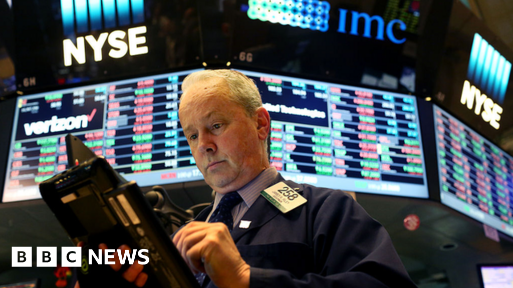 Dow Jones ends above 20,000 for first time