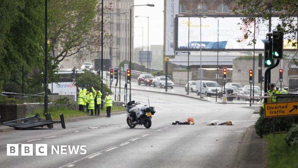 Aftermath of the crash with police offices at the scene