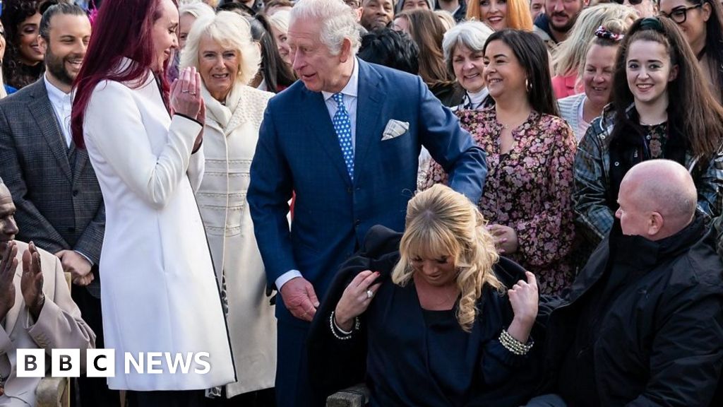 Prince Charles gets chivalrous on Eastenders set