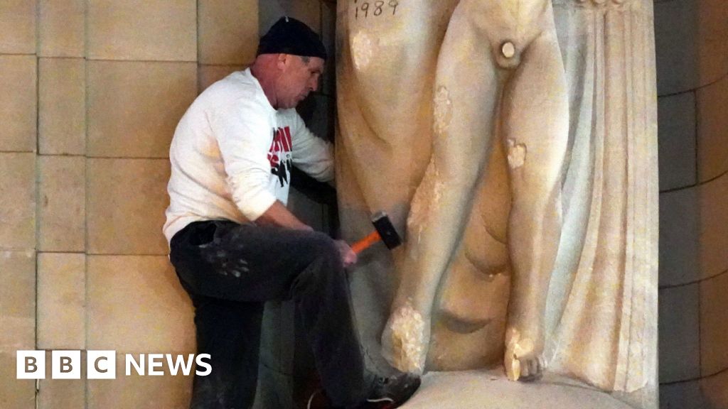 Man damages BBC headquarters statue with hammer