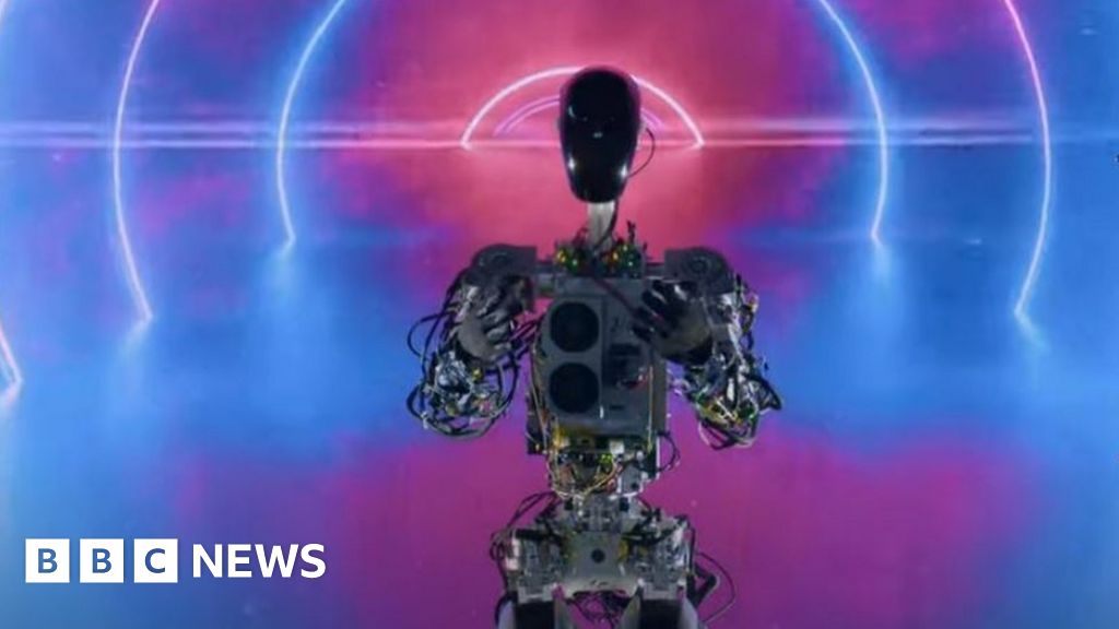 Tesla boss Elon Musk presents humanoid robot Optimus - BBC