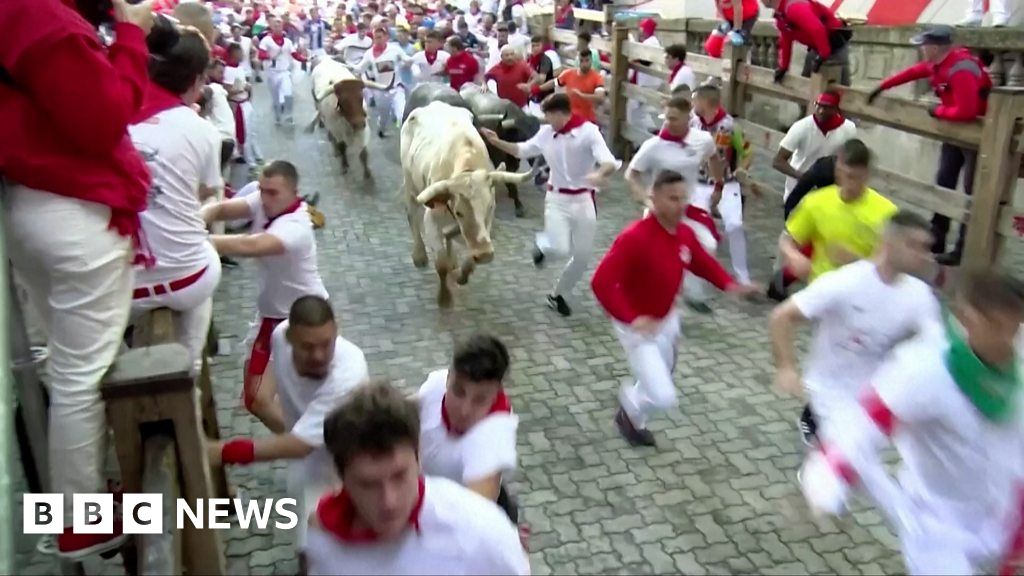 Four injured as bulls run through crowded Spanish street