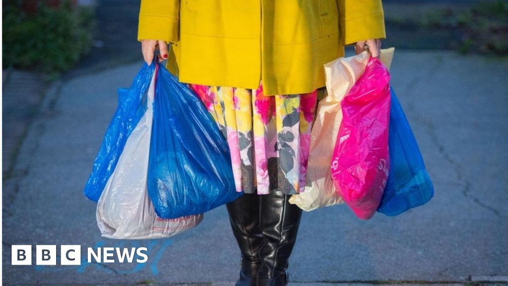 Plastic bag sales in England halved in past year - BBC News